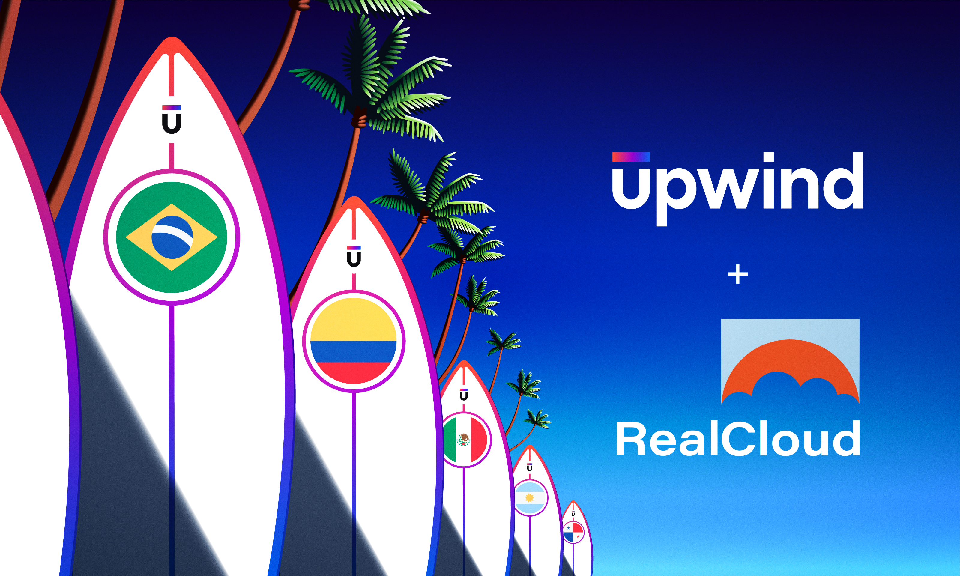 Surfboards stand upright with a tropical backdrop. Flags of Brazil, Colombia, and Mexico decorate the boards. Upwind and RealCloud logos are featured in the sky, suggesting a collaboration or partnership.