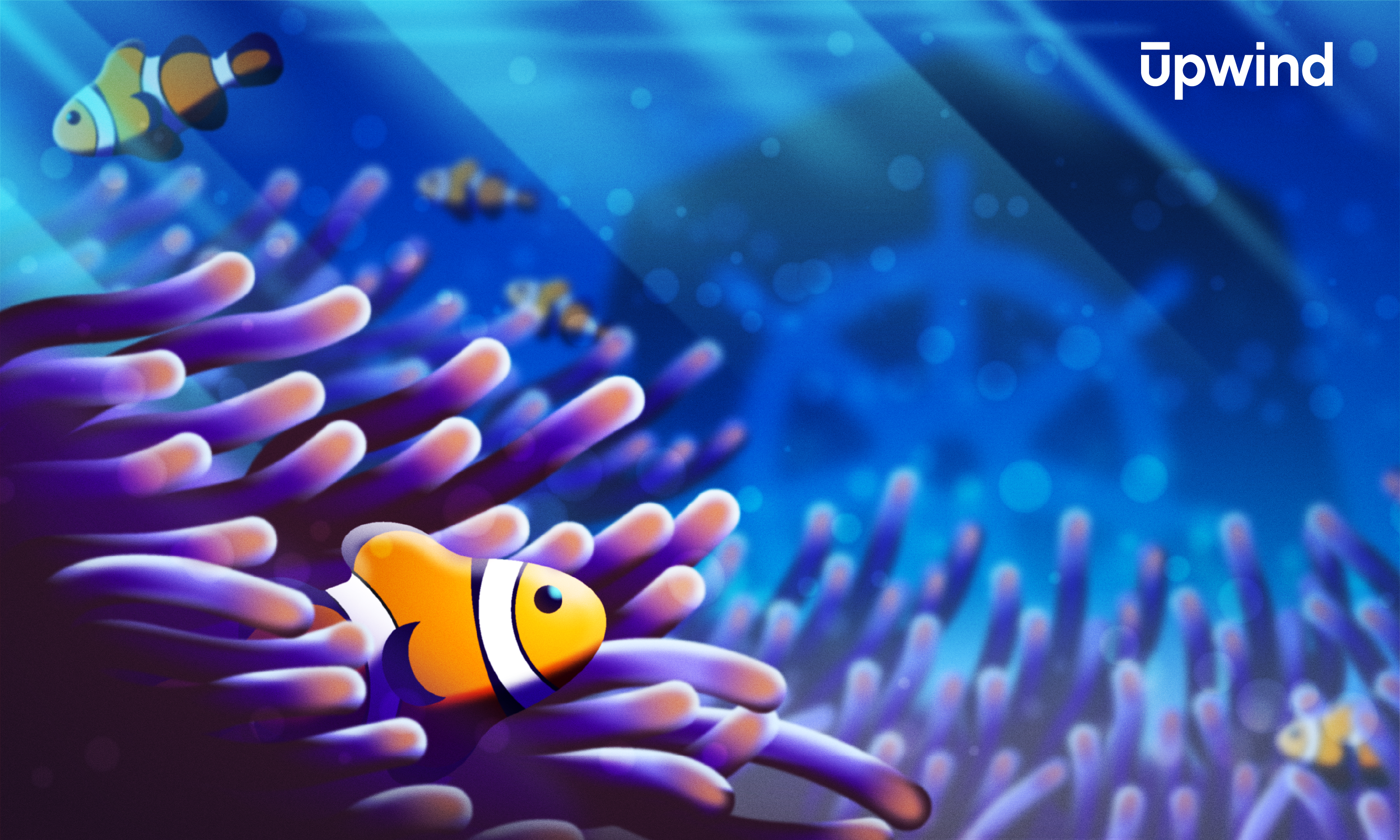 A cartoon clownfish swims through vibrant purple and blue coral in an underwater scene. Several other fish swim in the background, and light beams penetrate the water. The word Upwind is written in the top right corner.