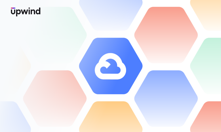 A pattern of hexagons in pastel colors with a cloud symbol inside a central blue hexagon. The word Upwind appears in black text in the top left corner.